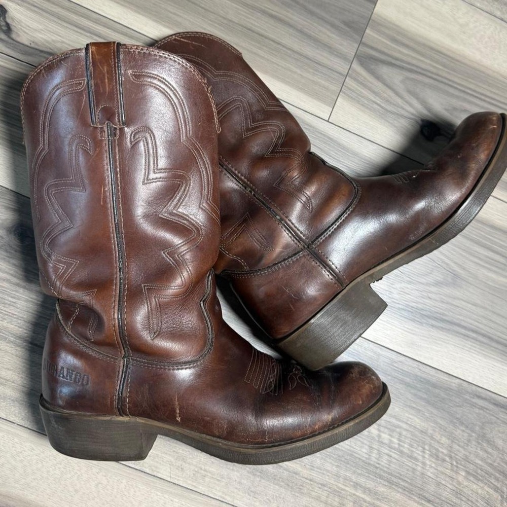 Vintage Durango brown leather cowboy boots featuring classic white stitching